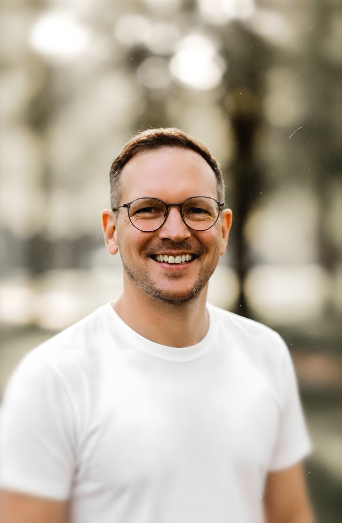 Max Brandt smiling outdoors